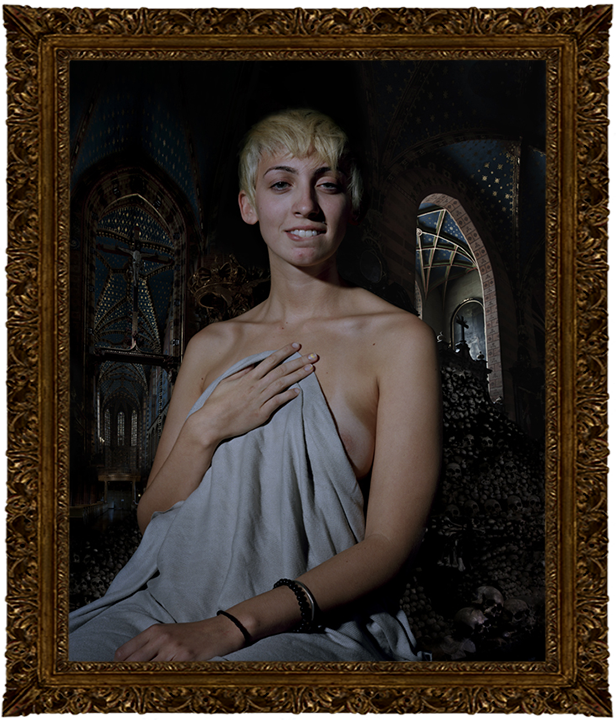 A nb queen holding a shawl to their chest and looking strong.